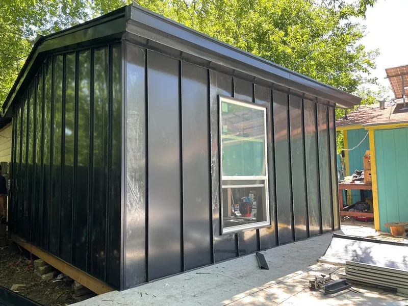 Black standing seam metal wall panels for Metal Roof Installation in Winston