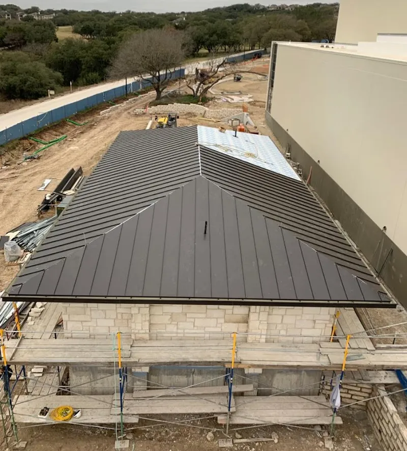 Metal roof new construction with scaffolding in Winston